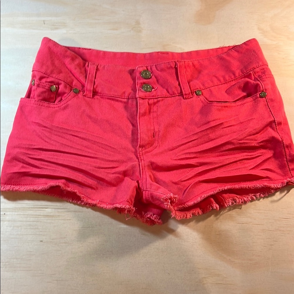 Refuge Pink Jean Shorts with a fringe hem,
Sz 8